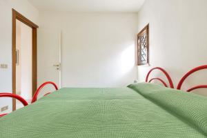 Ein Bett oder Betten in einem Zimmer der Unterkunft Appartamento Canneto by BarbarHouse