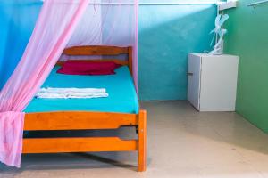 Postel nebo postele na pokoji v ubytování Voyage Guesthouse