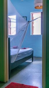 Postel nebo postele na pokoji v ubytování Voyage Guesthouse