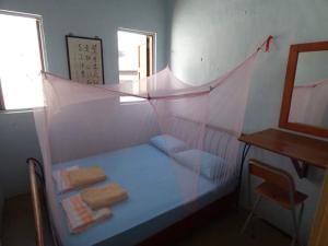 Postel nebo postele na pokoji v ubytování Voyage Guesthouse