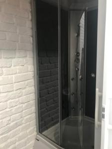 Ett badrum på Wilcza Apartments