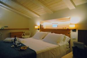 Postel nebo postele na pokoji v ubytování Dimora del Campo