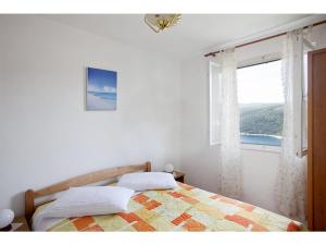 Katil atau katil-katil dalam bilik di Apartments Lina 2023
