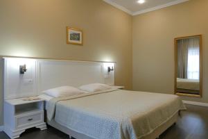 เตียงในห้องที่ Hotel Abaata