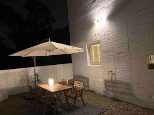 Patio atau area outdoor lain di 藍屋頂民宿-少人包棟民宿Blue Dome