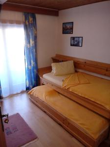 Postel nebo postele na pokoji v ubytování Gasthof Pisl