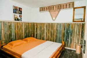 Letto o letti in una camera di Backpacker Kawah Ijen