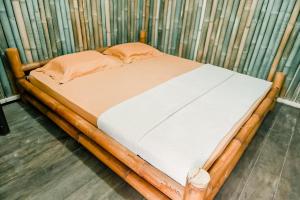Letto o letti in una camera di Backpacker Kawah Ijen