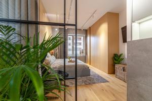 Łóżko lub łóżka w pokoju w obiekcie Apartament nad jeziorem Długim Leśna # 28