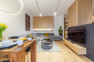 Część wypoczynkowa w obiekcie Apartament nad jeziorem Długim Leśna # 28