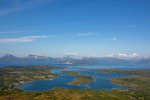 an aerial view of a group of islands in a body of water at Tysfjord Hotel in Storjord I Tysfjord