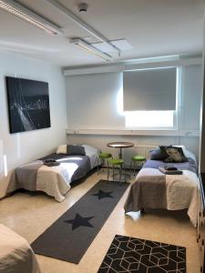Hostel400Kokkola tesisinde bir odada yatak veya yataklar
