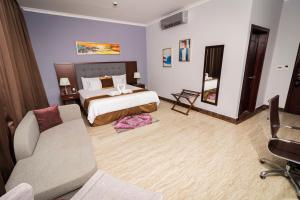 Postel nebo postele na pokoji v ubytování Hotel City Plaza & Suites