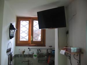A television and/or entertainment centre at Appartamento Vivaldi