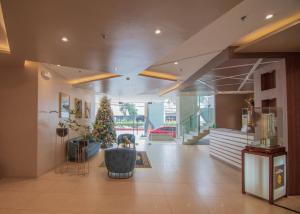 Lobby o reception area sa MIGAs Haven at Sunvida Tower across SM City