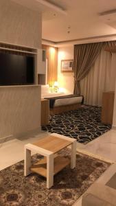 Posteľ alebo postele v izbe v ubytovaní Juri Ahla Al Masayef Furnished Units