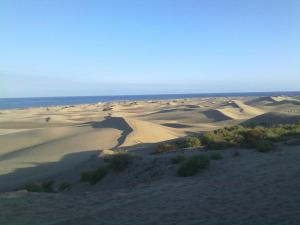 eine Luftansicht der Sanddünen in der Wüste in der Unterkunft Acogedor bungalow muy luminoso in Maspalomas