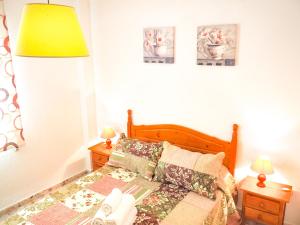 Posteľ alebo postele v izbe v ubytovaní ConilPlus apartments AZORIN II