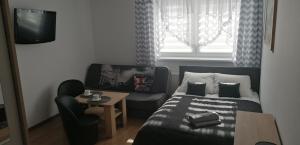 Postel nebo postele na pokoji v ubytování Willa Zawada
