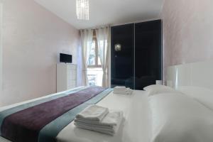 Кровать или кровати в номере Casa da Suite Fantasia