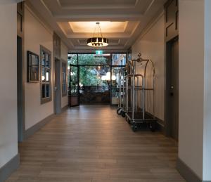 a hallway with a hallway flooring and a hallwayngth at Prestige Vernon Lodge in Vernon