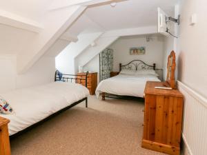 Postel nebo postele na pokoji v ubytování Trevena Lodge