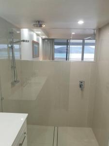 Ένα μπάνιο στο Frangipani 103 - Hamilton Island