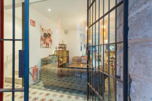 a view of a living room through a window at Alcudia Petit - Turismo de Interior in Alcudia