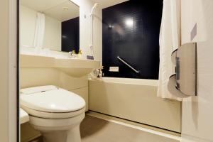 Ein Badezimmer in der Unterkunft JR Inn Sapporo