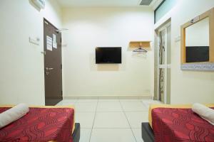 TV a/nebo společenská místnost v ubytování COOP HOTEL PUTRAJAYA & CYBERJAYA
