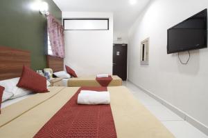 TV a/nebo společenská místnost v ubytování COOP HOTEL PUTRAJAYA & CYBERJAYA