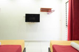 TV a/nebo společenská místnost v ubytování COOP HOTEL PUTRAJAYA & CYBERJAYA