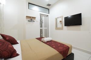 TV a/nebo společenská místnost v ubytování COOP HOTEL PUTRAJAYA & CYBERJAYA