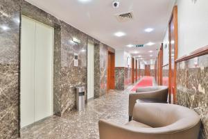Zona de estar de Sun And Sands Downtown