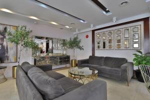 Zona de estar de Sun And Sands Downtown