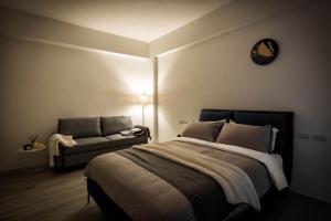 Postel nebo postele na pokoji v ubytování 單眼皮民宿 Single Eyelid Hostel