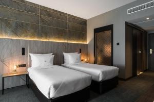 Posteľ alebo postele v izbe v ubytovaní Nosalowy Park Hotel & Spa
