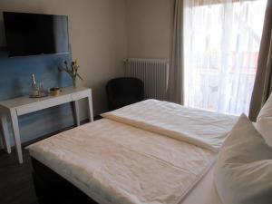 Cama o camas de una habitación en Pension Sonnengrund