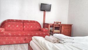 Posteľ alebo postele v izbe v ubytovaní Pension Relax
