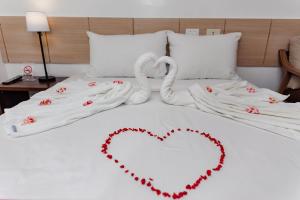 Voodi või voodid majutusasutuse Soi Suites toas