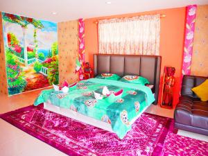 Postel nebo postele na pokoji v ubytování Mexican Resortlampang