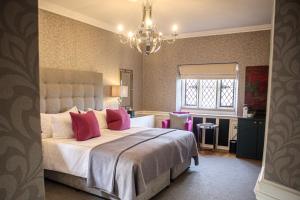 Great Fosters - Near Windsor客房内的一张或多张床位