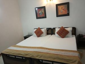 Postel nebo postele na pokoji v ubytování Solo Victoria Hotel