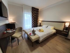 TV a/nebo společenská místnost v ubytování Berg'hotel