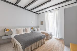 Postel nebo postele na pokoji v ubytování Saint Peter Elegant and Charming Apartment