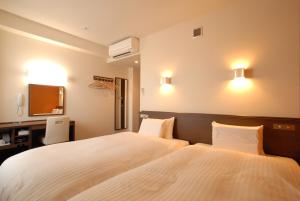 Katil atau katil-katil dalam bilik di AB Hotel Fukaya