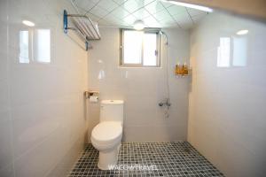 Een badkamer bij 懶人旅宿