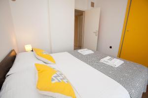 Posteľ alebo postele v izbe v ubytovaní Sunny & Relaxing Apartment