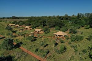 an aerial view of a group of houses on a hill at Hluhluwe Bush Camp in Hluhluwe