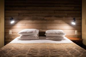 
Кровать или кровати в номере Хибины Отель 
